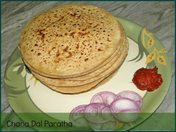 Chana dal paratha is a healthy and yummy stuff Indian flatbread where the outer layer is made of fiber-rich whole wheat flour and filling is protein-rich lentil. Putting together this chana dal paratha is good enough to start your day and keeps you going. This stuffed Indian flatbread served for lunch or dinner and can be relished with curd or pickle.