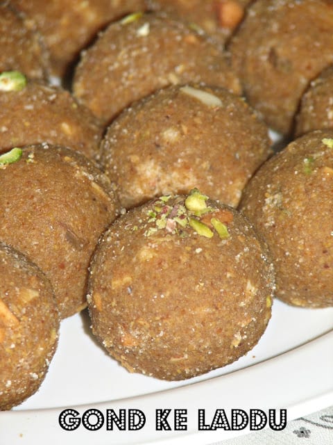 a close up click of gond ke laddu with sugar
