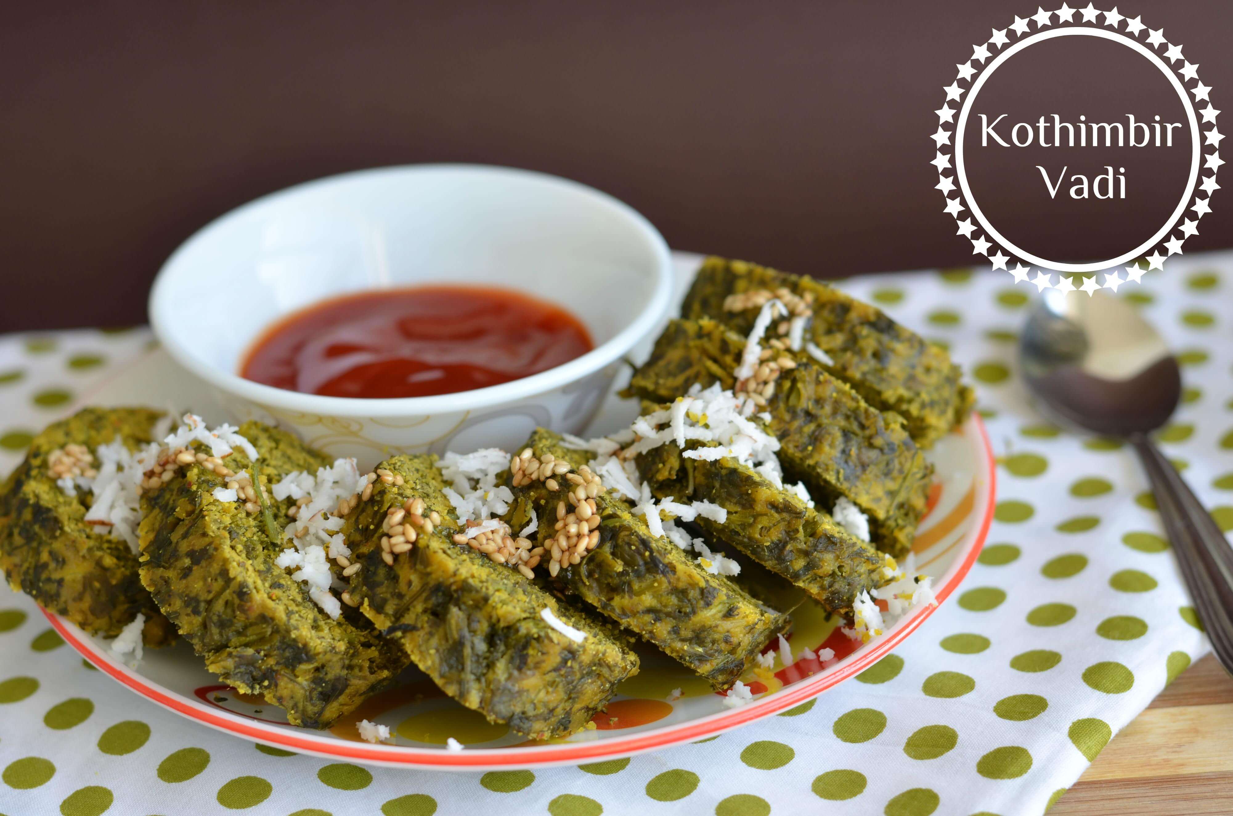 Kothimbir Vadi | Kothimbir Vadi is a popular Maharashtrian snack which is steamed and pan-fried. It is made with fresh coriander leaves, chickpea flour, spiced up using ginger, garlic, green chili, garam masala. Kothimbir Vadi is a popular Maharashtrian snack which is steamed and pan-fried. It is made with fresh coriander leaves, chickpea flour, spiced up using ginger, garlic, green chili, garam masala. Kothimbir Vadi is a glutenfree snack, you can have it in breakfast or a side dish in the Maharashtrian thali.