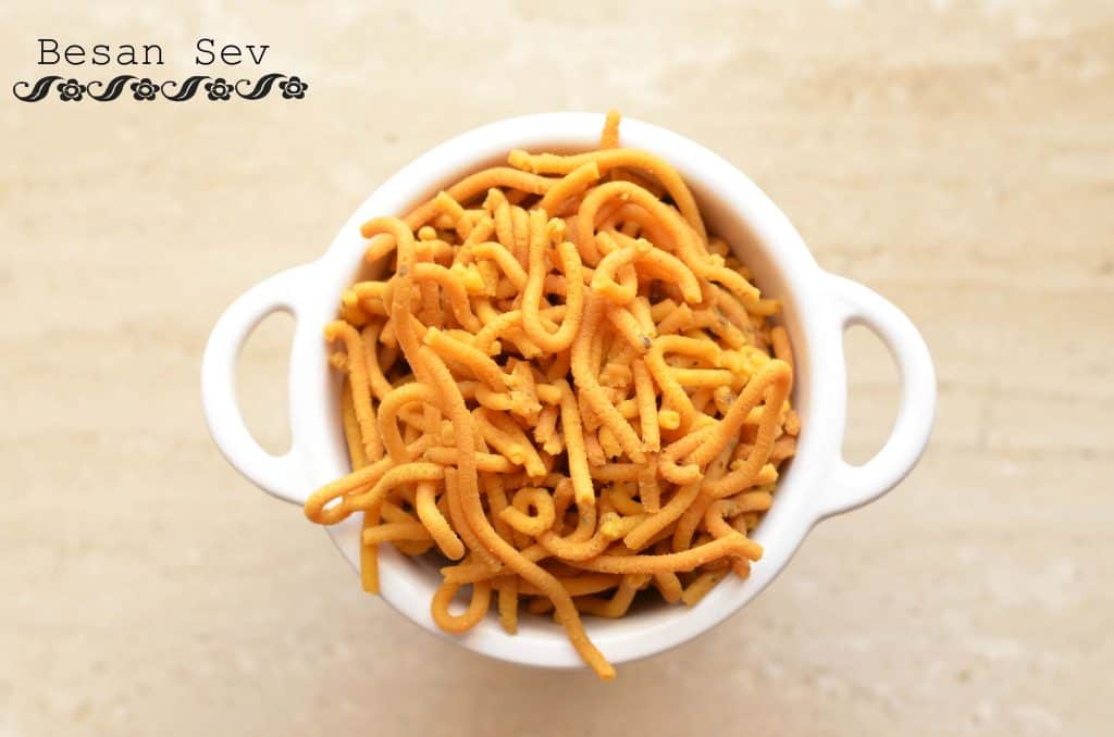 Besan Sev | How to make Besan Sev Besan sev is a very famous snack prepared in every household kitchen in India. It is a blend of besan or gram flour and a few spices, which is deep-fried. They are crisp and savory in taste and a great tea time snack. This snack is made during Holi or Diwali, though you can cook throughout the year