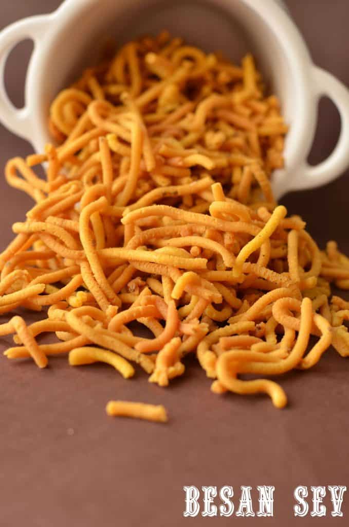 Besan Sev | How to make Besan Sev Besan sev is a very famous snack prepared in every household kitchen in India. It is a blend of besan or gram flour and a few spices, which is deep-fried. They are crisp and savory in taste and a great tea time snack. This snack is made during Holi or Diwali, though you can cook throughout the year