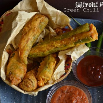 Bherwa Mirch ka pakora is stuffed green peppers with mashed potatoes filling with some aromatics spices, dipped in spicy besan (gram flour) batter and deep fried. It is a popular Rajasthani street food known as bherwa mirch vada too.