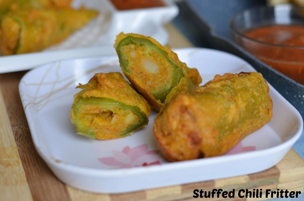 Bherwa Mirch Ka Pakora | Stuffed Green Chili Fritters Bherwa Mirch ka pakora is stuffed green peppers with mashed potatoes filling with some aromatics spices, dipped in spicy besan (gram flour) batter and deep fried. It is a popular Rajasthani street food known as bherwa mirch vada too.