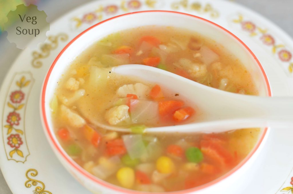 Corn Veg Soup - How to make corn veg soup with little twist Corn veg soup is delicious with crunchy vegetables and aroma of garlic and giner. A dash of pepper powder makes it little spicy but overall is lip smacking soup.