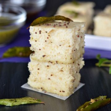Oats dhokla is the instant dhokla recipe with oats flour, semolina and curd in equal portions, which is a savory and steamed snack or a great breakfast or a great meal in itself. Seasoned with mustard seeds, curry leaves and green chilies this oats dhokla is a perfect guilt-free food to consume.