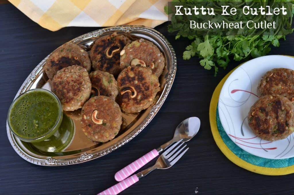 Kuttu Ki Tikki | Buckwheat Cutlet Recipe | Buckwheat Potato Croquette overhead shot of Kuttu ki Tikki or buckwheat cutlet served with chutney and cutlery.