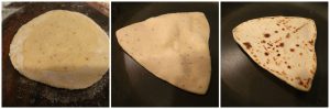 cooking ajwain paratha on hot griddle