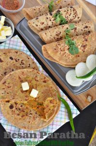Besan paratha or masala besan paratha is a wonderful Rajasthani paratha recipe which is prepared by stuffing spicy besan or gram flour filling in the whole wheat dough. This paratha is crispy, aromatic and filled with the pickled flavor besan stuffing makes a wholesome meal.