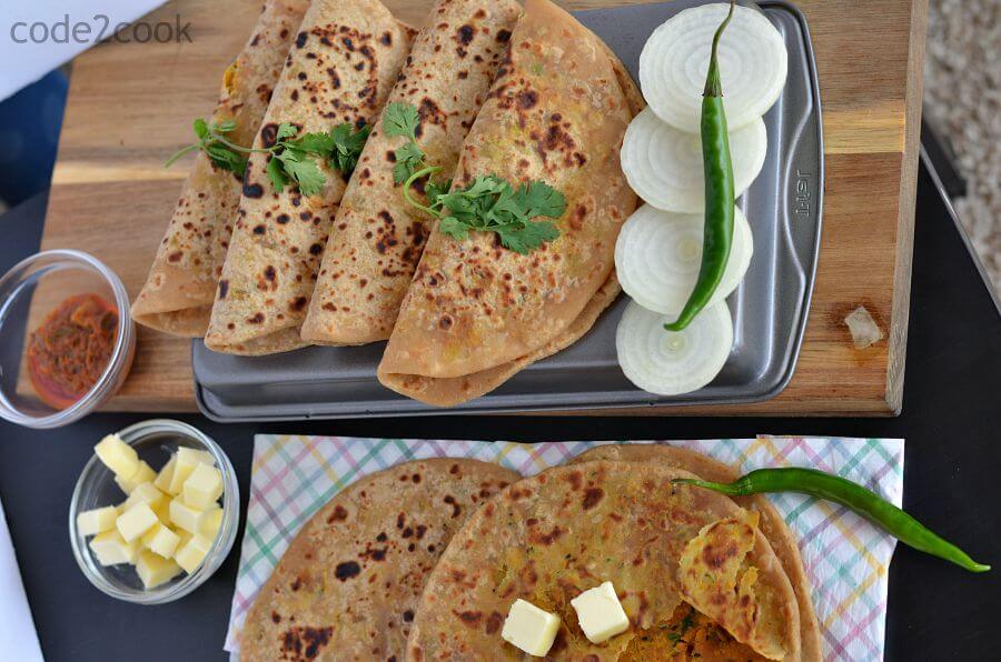 Achari Besan Paratha Recipe | How To Make Besan Paratha | Masala Besan Paratha Besan paratha or masala besan paratha is a wonderful Rajasthani paratha recipe which is prepared by stuffing spicy besan or gram flour filling in the whole wheat dough. This paratha is crispy, aromatic and filled with the pickled flavor besan stuffing makes a wholesome meal.