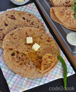 Besan paratha or masala besan paratha is a wonderful Rajasthani paratha recipe which is prepared by stuffing spicy besan or gram flour filling in the whole wheat dough. This paratha is crispy, aromatic and filled with the pickled flavor besan stuffing makes a wholesome meal.