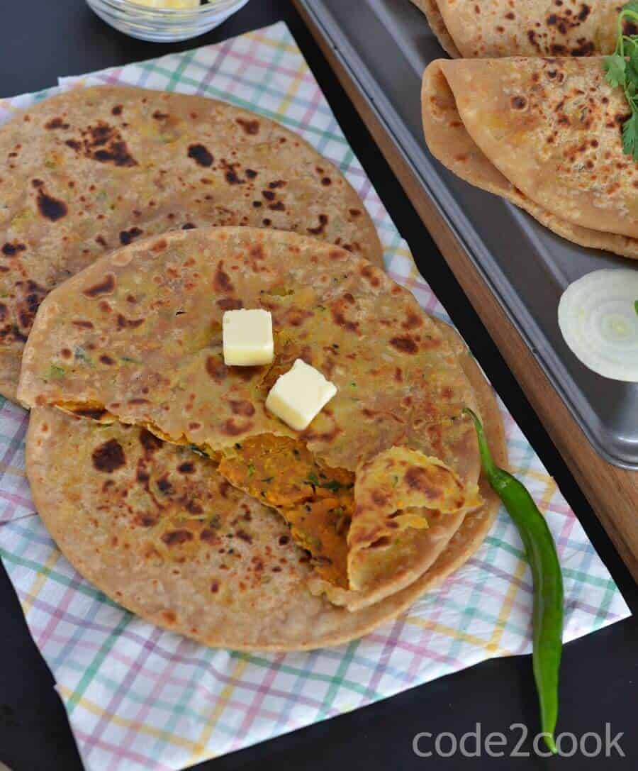 Achari Besan Paratha Recipe | How To Make Besan Paratha | Masala Besan Paratha Besan paratha or masala besan paratha is a wonderful Rajasthani paratha recipe which is prepared by stuffing spicy besan or gram flour filling in the whole wheat dough. This paratha is crispy, aromatic and filled with the pickled flavor besan stuffing makes a wholesome meal.