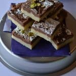 Chocolate burfi is one of the popular Indian festival sweet prepared during Diwali. It is a khoya burfi or mawa burfi recipe. Chocolate burfi is two layered burfi recipe, where the bottom layer is plain mawa layer and the top layer is chocolate flavored.