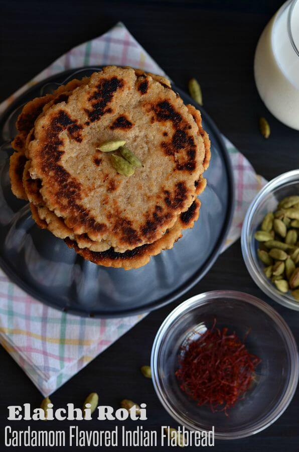 Elaichi Roti Recipe | Cardamom Flavored Indian Flatbread sweet paratha or cheeni ka paratha stacked over grey bowl.