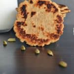 Elaichi roti or cardamom flatbread is a very simple Indian flatbread which can be prepared in a jiffy whenever you crave for something sweet. In whole wheat flour added sugar granules, flavored with saffron strands and cardamom, kneaded using milk. This bread is sweet, crispy, and thick in texture. Elaichi roti tastes great if taken with milk.