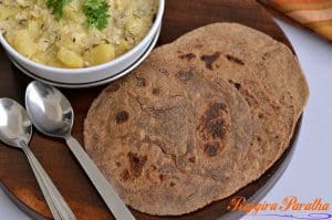 Amarnath flour paratha or Rajgira paratha is commonly used during Navratri fasting days in most Indian Kitchen. This is a gluten-free and vegan flatbread. Adding boiled mashed potato while making a dough with the flour, helps to make paratha or flatbread. This is very quick and easiest paratha recipe to make on fasting days or upvas. Such paratha recipe is also known as farali paratha or falahari paratha (phalahari paratha).