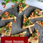 Xmas paratha, basically a whole wheat yeast flatbread which is kneaded with dry fruits powder. Further added cheese, bell pepper, green coriander then cut into Christmas tree shape