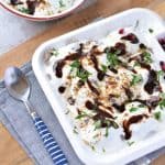 Kuttu ka dahi Bhalla or vrat ka dahi vada made with buckwheat flour and then combined with beaten curd/yogurt, vrat ki chutney, cumin seed powder, and green coriander.