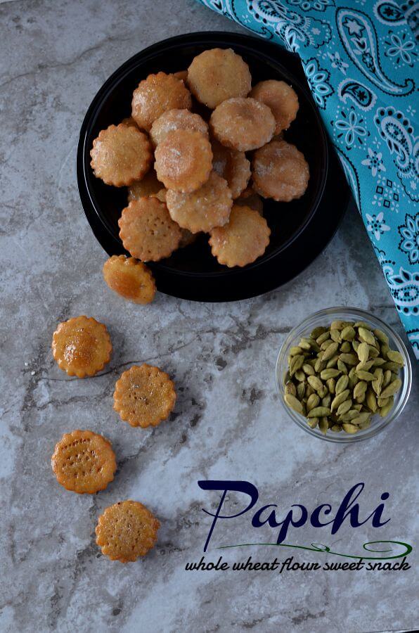 Papchi Recipe | Wholewheat Flour Sweet Snack From Chhattisgarh wholewheat snack Papchi served in a black bowl over marble background.