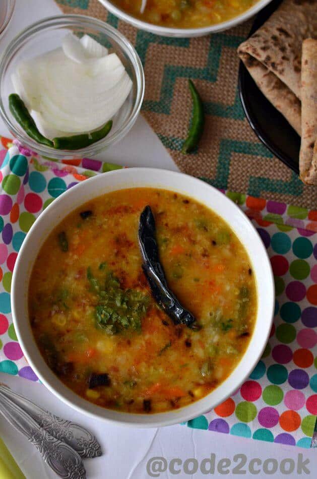 Mix vegetable moong dal is a healthy, nutritious and a flavorful vegan lentil recipe. This is a wholesome lentil soup with loads of vegetables with fewer spices. This one pot dal is very easy to make and gets ready under 30 minutes. Mix vegetable moong dal is a healthy, nutritious and a flavorful vegan lentil recipe. This is a wholesome lentil soup with loads of vegetables with fewer spices. This one pot dal is very easy to make and gets ready under 30 minutes.