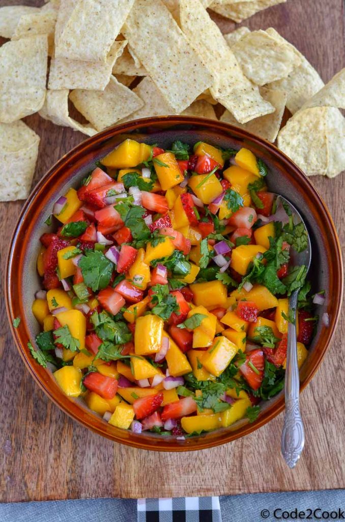 strawberry mango salsa served with tortilla strips.