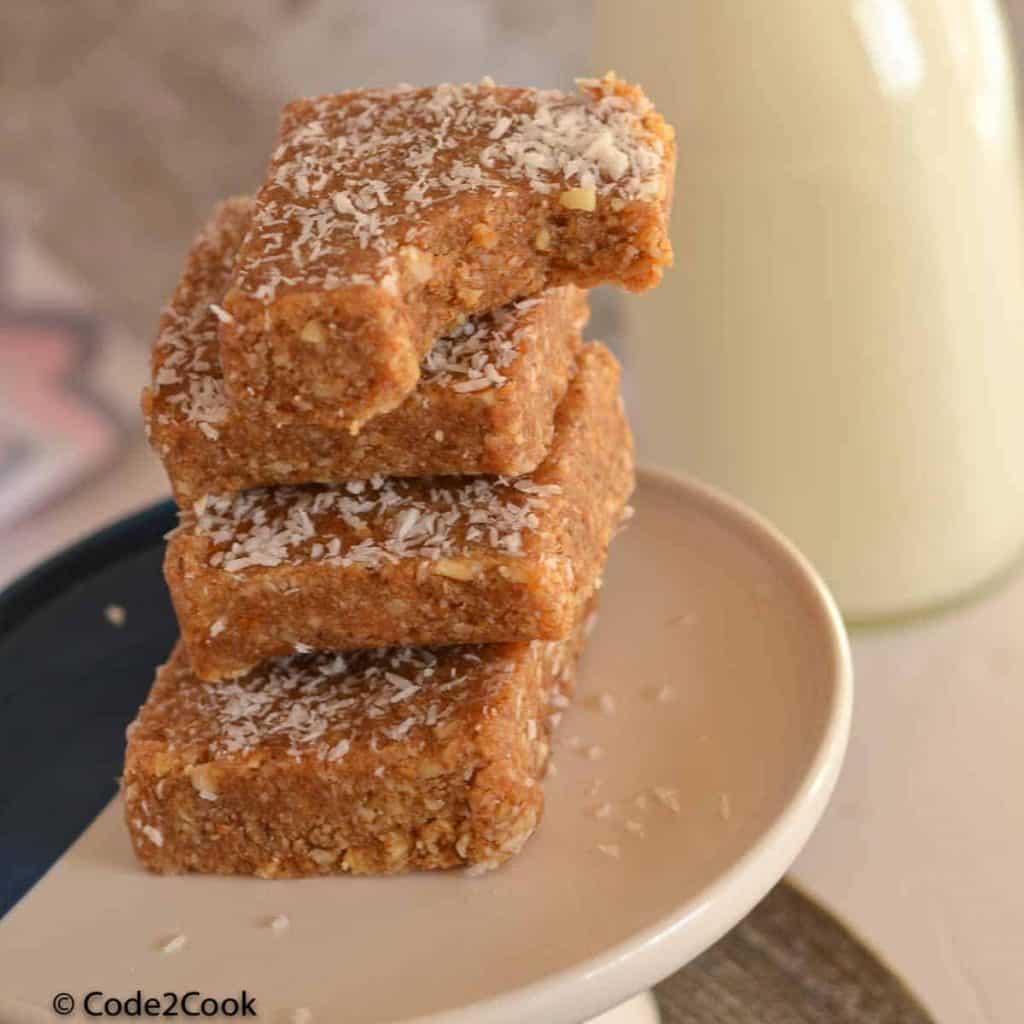 macadamia nut bars are placed on cookie stand.