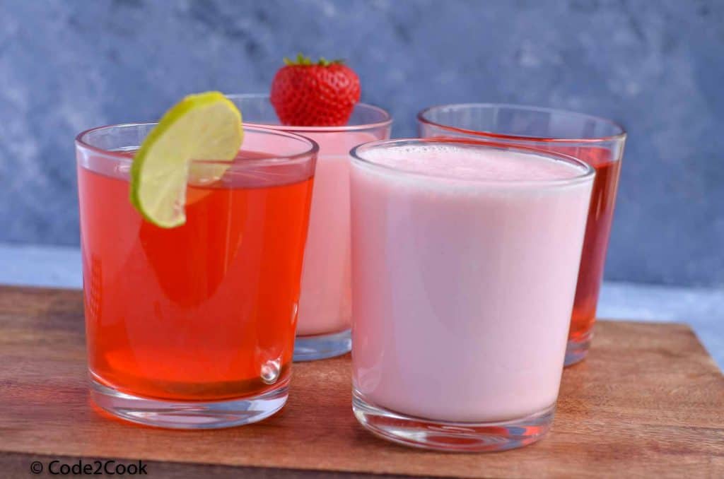 four roohafza drinks served in glass.