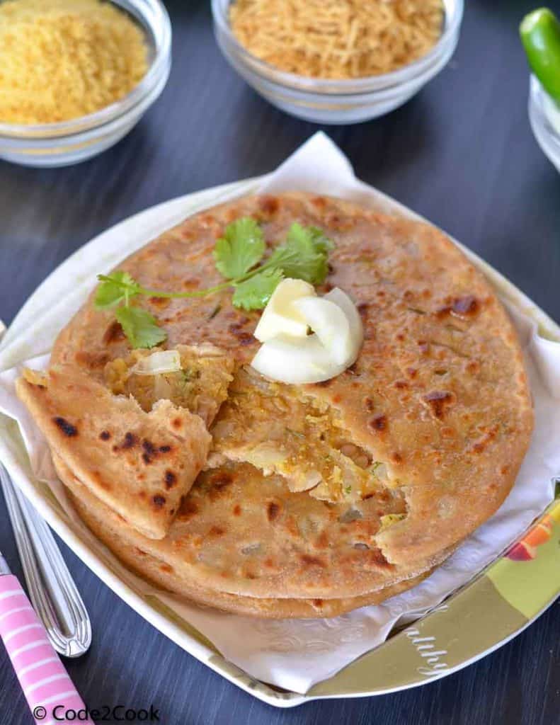 sev paratha served with sen namkeen, pickle & chilies.