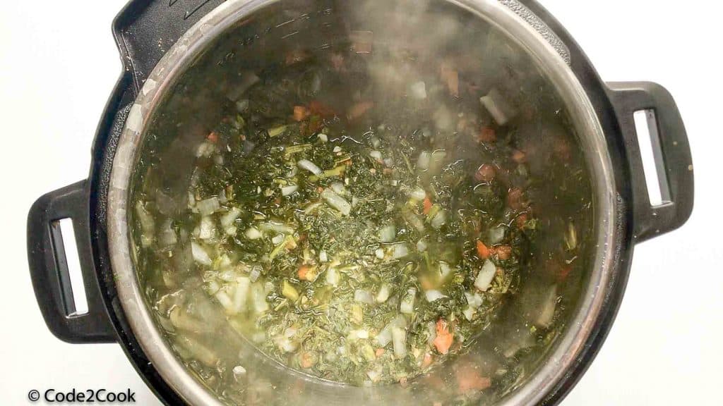 stir the mixture of saag