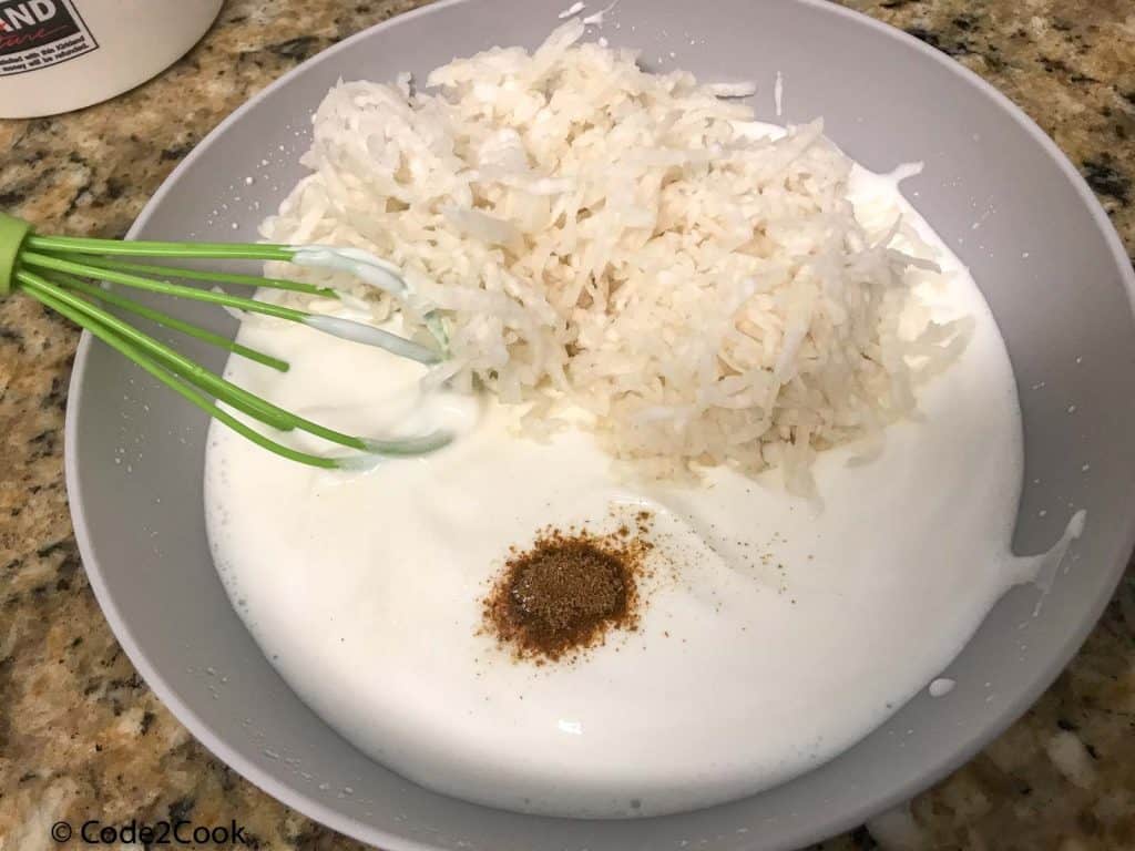 add, salt, roasted cumin powder & grated mooli in whisked yogurt